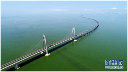 新华社纪念新中国成立70周年成就重要述评特别介绍英国上市公司365董事长熊建明